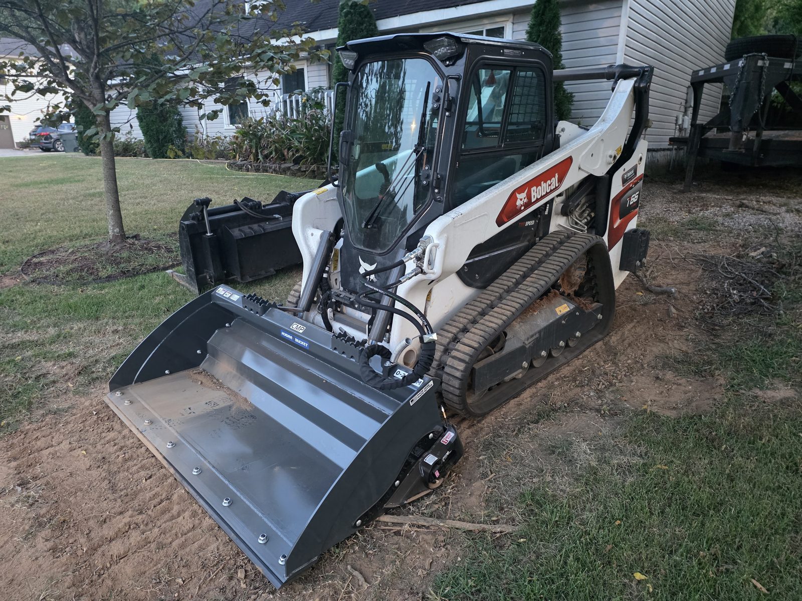 Bobcat T66 track loader with Hydra Bucket